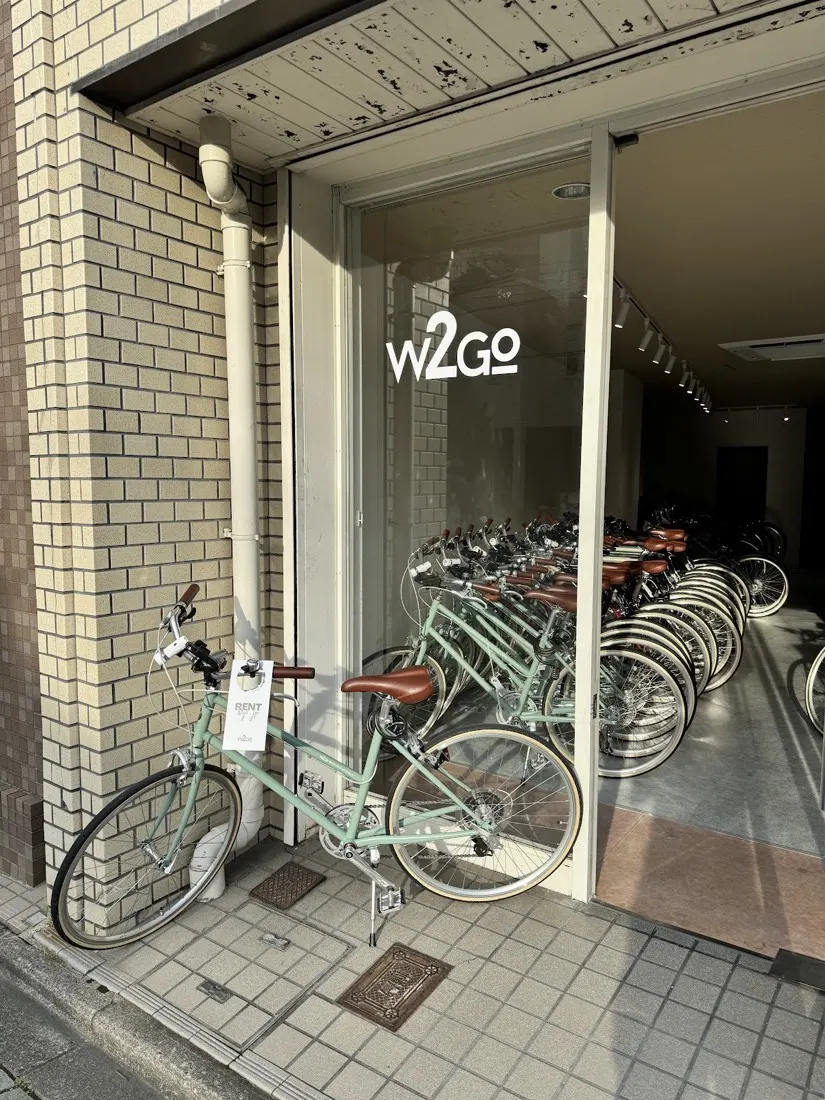 The w2go shop front in Higashiyama, a mint tokyobike parked at the glass door